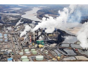 Aerial view of the Suncor oil sands extraction facility near the town of Fort McMurray in Alberta on October 23, 2009. On Wednesday in a leading science magazine, academics called for a moratorium on oilsands and pipeline projects. MARK RALSTON/AFP/Getty Images