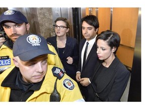 Jian Ghomeshi leaves court in Toronto, Wednesday, Nov.26, 2014. Ghomeshi has been granted bail just hours after being charged with multiple counts of sexual assault.(THE CANADIAN PRESS/Nathan Denette)