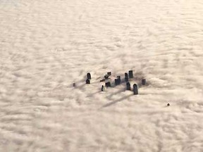 In this aerial photo, downtown Dallas is enveloped in morning fog, Tuesday, Dec. 9, 2014. The National Weather Service issued a dense fog advisory Tuesday morning for the Dallas-Fort Worth area. The heavy fog has delayed some flights in North Texas.