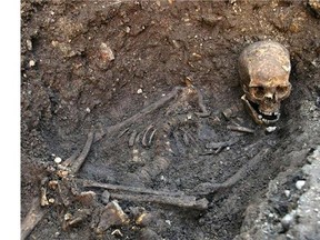 A human skeleton found underneath a car park in Leicester, England, September 2012, which has been declared "beyond reasonable doubt" to be the long lost remains of England's King Richard III. (University of Leicester)