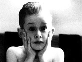 Macaulay Culkin portrays Kevin McCallister is a scene from the family comedy "Home Alone," in a 1990 publicity photo from 20th Century Fox.