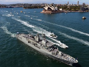 Royal Australian Navy warship HMAS Paramatta sails in front of the iconic Sydney Opera House on October 4, 2013 as part of celebrations to commemorate 100 years since the Royal Australian Navy's fleet first entered the city's waters. Ships from nations including China, Thailand, the United States, Malaysia, France, Japan and former colonial power Britain passed through the heads into the famous harbour where they joined 16 tall ships from around the world in preparation for a ceremonial fleet review. AFP PHOTO / Saeed KhanSAEED KHAN/AFP/Getty Images