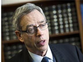 Conservative MP Joseph Oliver, the minister of finance, is photographed during an interview with the Ottawa Citizen's Jason Fekete on Parliament Hill Thursday, December 11, 2014. (Darren Brown/Postmedia News)