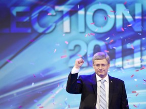 Conservative leader Stephen Harper waves to supporters gathered at the Telus Convention Centre in Calgary, Alberta, May 2, 2011 as he celebrates the election of a Conservative majority government in the federal election.  Canadian Prime Minister Stephen Harper won re-election Monday at the head of an elusive majority government, the first for his Conservative Party since 1988, television projections showed.  In a ground-breaking election full of firsts, the left-leaning New Democratic Party was on course to surge past the Liberals, who governed for most of the last century, and become Canada's official opposition.  Capping a disastrous night for the separatist Bloc Quebecois, their leader Gilles Duceppe lost his seat two decades after he was first elected to parliament and the party was set to be reduced to just two seats, from 47.  AFP PHOTO / GEOFF ROBINS (Photo credit should read GEOFF ROBINS/AFP/Getty Images)