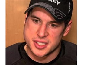 Sydney Crosby of the Pittsburgh Penguins being interviewed when it appears he has the mumps. (Postmedia News)