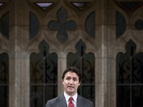 Liberal Leader Justin Trudeau rises during Question Period in the House of Commons Tuesday November 25, 2014 in Ottawa. THE CANADIAN PRESS/Adrian Wyld