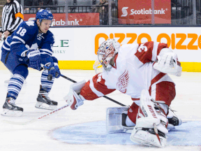 Ex Spit Richard Panik, left, is stopped by Detroit goaltender Petr Mrazek Saturday at the Air Canada Centre. (THE CANADIAN PRESS/Chris Young)