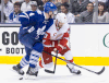 Toronto’s Cody Franson, left, collieds with Detroit’s Henrik Zetterberg Saturday at the Air Canada Centre. (THE CANADIAN PRESS/Chris Young)