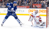 Ex-Spit Richard Panik, left, scores the winning goal on Detroit goalie Petr Mrazek at the Air Canada Centre Saturday. (THE CANADIAN PRESS/Chris Young)