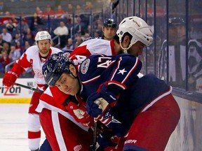 Kingsville's Dalton Prout, right, is checked by Detroit's Todd Bertuzzi last year in Columbus.(Photo by Kirk Irwin/Getty Images)