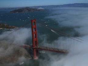 The north tower of the Golden Gate Bridge is seen surrounded by fog on September 8, 2013 in San Francisco, California.  (Justin Sullivan/Getty Images)