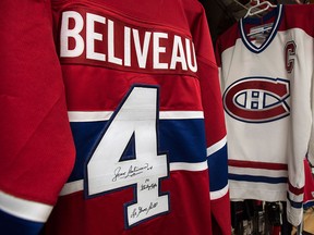 A signed jersey of former Montreal Canadiens legend Jean Beliveau is seen at the pro shop of the Jean Beliveau Arena Wednesday, December 3, 2014 in Longueuil, Que. Beliveau died at the age of 83. THE CANADIAN PRESS/Paul Chiasson