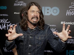 Dave Grohl attends the premiere of HBO's "Foo Fighters Sonic Highway" on Tuesday, Oct. 14, 2014, In New York. (Photo by Andy Kropa/Invision/AP)