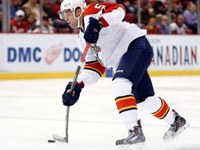 Belle River's Aaron Ekblad shoots the puck against the Detroit Red Wings in the first period at Joe Louis Arena Tuesday. (AP Photo/Paul Sancya)