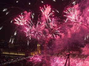 Fireworks light up the London skyline and Big Ben just after midnight on January 1, 2015 in London, England. Thousands of people lined the banks of the River Thames in central London to see in the New Year with a spectacular fireworks display. (Photo by Rob Stothard/Getty Images)