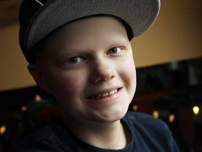 Andrew Gatto is photographed at his home in Windsor on Tuesday, December 23, 2014. Gatto is home from the hospital where he has been receiving cancer treatments.   (TYLER BROWNBRIDGE/The Windsor Star)