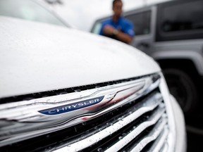Chrysler posted its best November in 13 years. (AP Photo/Gregory Bull)