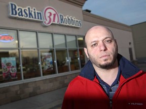 Ace Adhami, owner of Baskin-Robbins at 3090 Dougall Ave., is pictured in front of his store, Monday, Dec. 15, 2014.  Adhami was sitting at home and watched security feeds on his smartphone while his employees were being robbed.  (DAX MELMER/The Windsor Star)