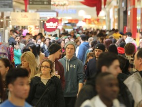 Shoppers look for Boxing Day deals at SoftMoc at Devonshire Mall, Friday, Dec. 26, 2014.  (DAX MELMER/The Windsor Star)