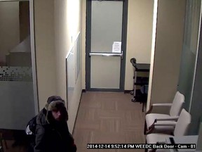 A security camera image of a man who broke into the offices of the WindsorEssex Economic Development Corporation on the night of Dec. 14, 2014. (Handout / The Windsor Star)