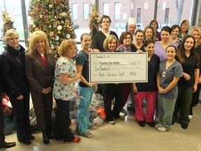 Staff at Hotel-Dieu Grace Healthcare donated about 200 coats and $600 to the Coats for Kids campaign Wednesday. (JASON KRYK/The Windsor Star)