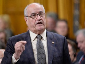 Veterans Affairs Minister Julian Fantino speaks during question period in the House of Commons on Parliament Hill in Ottawa, Tuesday Dec. 2, 2014 . THE CANADIAN PRESS/Adrian Wy