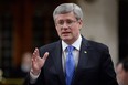 Prime Minister Stephen Harper answers a question during question period in the House of Commons, Tuesday, Dec. 9, 2014 in Ottawa. THE CANADIAN PRESS/Adrian Wyld