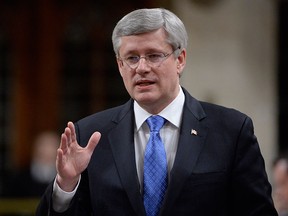 Prime Minister Stephen Harper answers a question during question period in the House of Commons, Tuesday, Dec. 9, 2014 in Ottawa. THE CANADIAN PRESS/Adrian Wyld