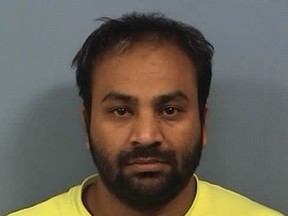 Karandeep Dadiala is shown in this booking photo from the DuPage County Jail in Illinois.