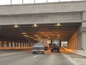 Traffic proceeds north through a new tunnel on the Herb Gray Parkway  near Cabana Road in Windsor, Ontario on December 18, 2014. (JASON KRYK/The Windsor Star)