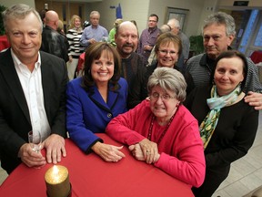 amily and friends of the late Dr. Bob Hupka gather with Hospice CEO Carol Derbyshire, centre left, during room dedication ceremony at Hospice of Windsor-Essex Thursday December 4, 2014. Bill Stiles, left, Don Hupka, Olive Hupka, Margaret Kelly, Tony Di Pasquale and Carol O'Neil, right, pose prior to the unveiling. (NICK BRANCACCIO/The Windsor Star)