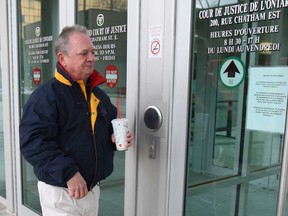 John Jordan enters Ontario Court of Justice in Windsor on Wed. Dec. 10, 2014. He is a witness in a human smuggling case. (DAN JANISSE/The Windsor Star) (For story by Sarah Sacheli)
