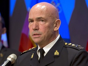 RCMP Commissioner Bob Paulson speaks in Ottawa, Monday December 1, 2014. THE CANADIAN PRESS/Adrian Wyld