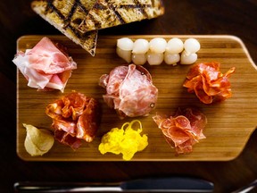 A charcuterie plate from Espana Spanish restaurant in Vancouver. (HANDOUT/Postmedia News)