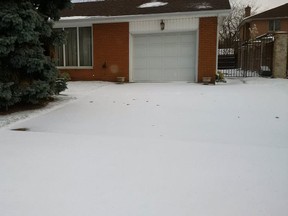 Pristine snow in the driveway of a LaSalle home is shown in this photo taken by Const. Jamie Nestor of LaSalle police.