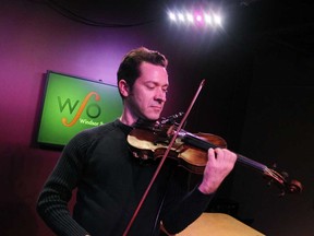 It was standing room only as Tino Popovic from the WSO performs at the Windsor Star News Cafe on December 17, 2014. (JASON KRYK/The Windsor Star)