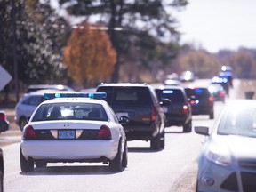 Funeral procession (file photo). (AP Photo/The Montgomery Advertiser, Albert Cesare)