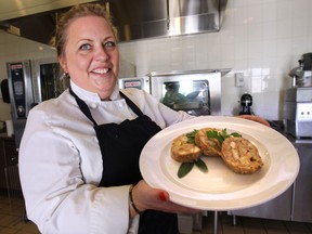 Chef Jodie Brown, at the Viewpointe Estate Winery in Harrow, displays a traditional holiday stuffing. (DAN JANISSE / The Windsor Star)