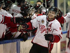 Leamington Flyers Blaine Bechard is congratulated by teammates after Ryan Muzzin's goal against LaSalle in Junior 'B' hockey action from Vollmer Centre Wednesday January 7, 2015. (NICK BRANCACCIO/The Windsor Star)