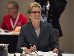 Kathleen Wynne's Liberal Party of Ontario won re-election on a bibg-spending progressive platform.
Photograph by: THE CANADIAN PRESS/Andrew Vaughan ,
