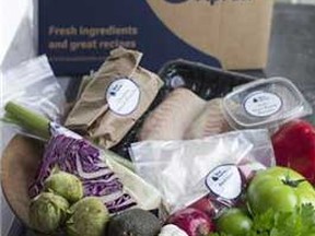 An example of a home-delivered meal from Blue Apron, in Concord, N.H. Sites like Blue Apron, HelloFresh and Plated deliver weekly boxes of raw ingredients _ including spices. (AP Photo/Matthew Mead)