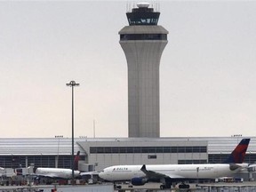 FILE - This Dec. 26, 2009, file photo shows jets outside Detroit Metropolitan airport in Romulus, Mich. A $225 million runway that opened in 2001 at Detroit Metropolitan Airport is deteriorating well ahead of its expected life of 30 years because of a common problem with concrete used in recent years, authorities say. (AP Photo/Carlos Osorio, File)