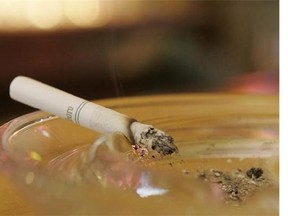 A cigarette rests in an ashtray at the Red Key Taven in Indianapolis, Thursday, June 11, 2009. It seems not all smokers are created equal when it comes to how their bodies handle nicotine, and that could have big implications for anyone trying to kick the habit for good, researchers suggest. THE CANADIAN PRESS/AP/Darron Cummings