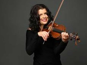 After years of standing to the side as a session player — for such headline names as Led Zeppelin, James Taylor and Blue Rodeo — Toronto fiddler Anne Lindsay, shown in a handout photo, focused intently on herself for "Soloworks."