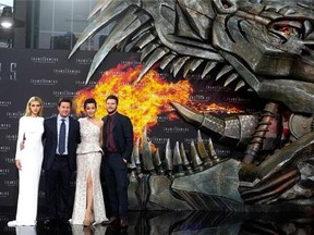 Nicola Peltz, Mark Wahlberg, Li Bingbing, and Jack Reynor pose for photographers, during the European premiere of the film "Transformers: Age of Extinction," at Potsdamer Platz in Berlin. Transformers" is rolling out with the most nominations at this year's Golden Raspberry Awards. The action sequel starring Wahlberg alongside the morphing robots led the Razzie lineup Tuesday, Jan. 13, 2015, with seven nominations, including worst picture, worst sequel, worst screenplay and worst screen combo. (AP Photo/Markus Schreiber, File)