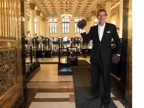 Founder of Goodlife Fitness, David Patchell-Evans, stands at the front doors of his newest location in Calgary inside the historic Bank of Montreal building on January 13, 2015.
(Christina Ryan/Postmedia News)