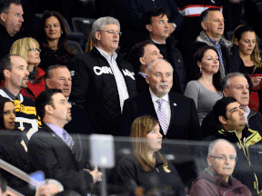 Prime Minister Stephen Harper watches the game between the Spits and Frontenacs in Kingston Saturday.(AARON BELL/OHL Images)