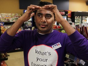 Mac's Convenience Store clerk Budha Gundasi explains how a man covered his face and held a homemade spear late Tuesday night on Mill Street. Gundasi told Windsor Police that the man's face was covered almost entirely, January 14, 2015. The spear appeared to be made by attaching a kitchen knife to the end of a stick. (NICK BRANCACCIO/The Windsor Star)