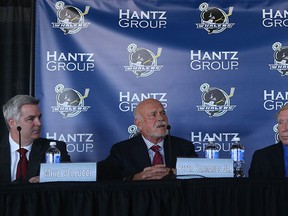 Whalers governor Mike Vellucci, from left, Pete Karmanos, Rolf Nielsen and Costa Papista answer questions at a news conference at Compuware Arena in Plymouth. (RENA LAVERTY/Plymouth Whalers)