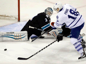 San Jose goalie Antti Niemi, left, deflects a shot from former Spitfire Richard Panik of the Leafs during the third period in San Jose, Calif. (AP Photo/Marcio Jose Sanchez)